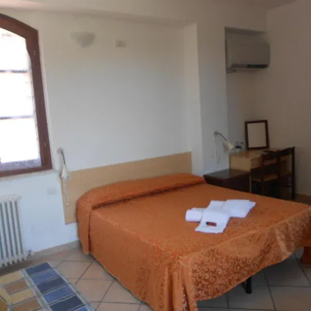 Soggiorno La Primula Siena Camera foto